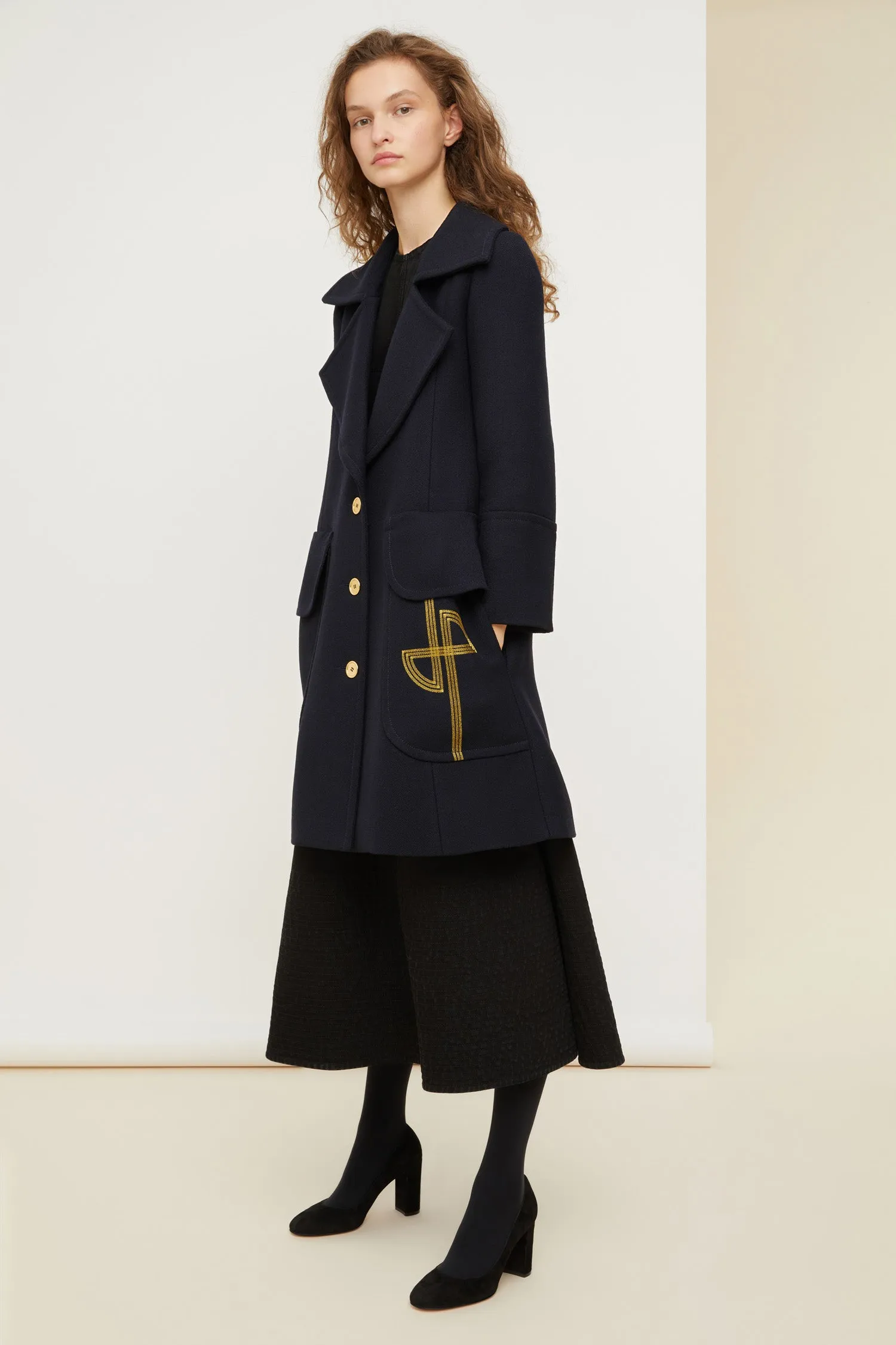Longline wool coat with embroidered logo