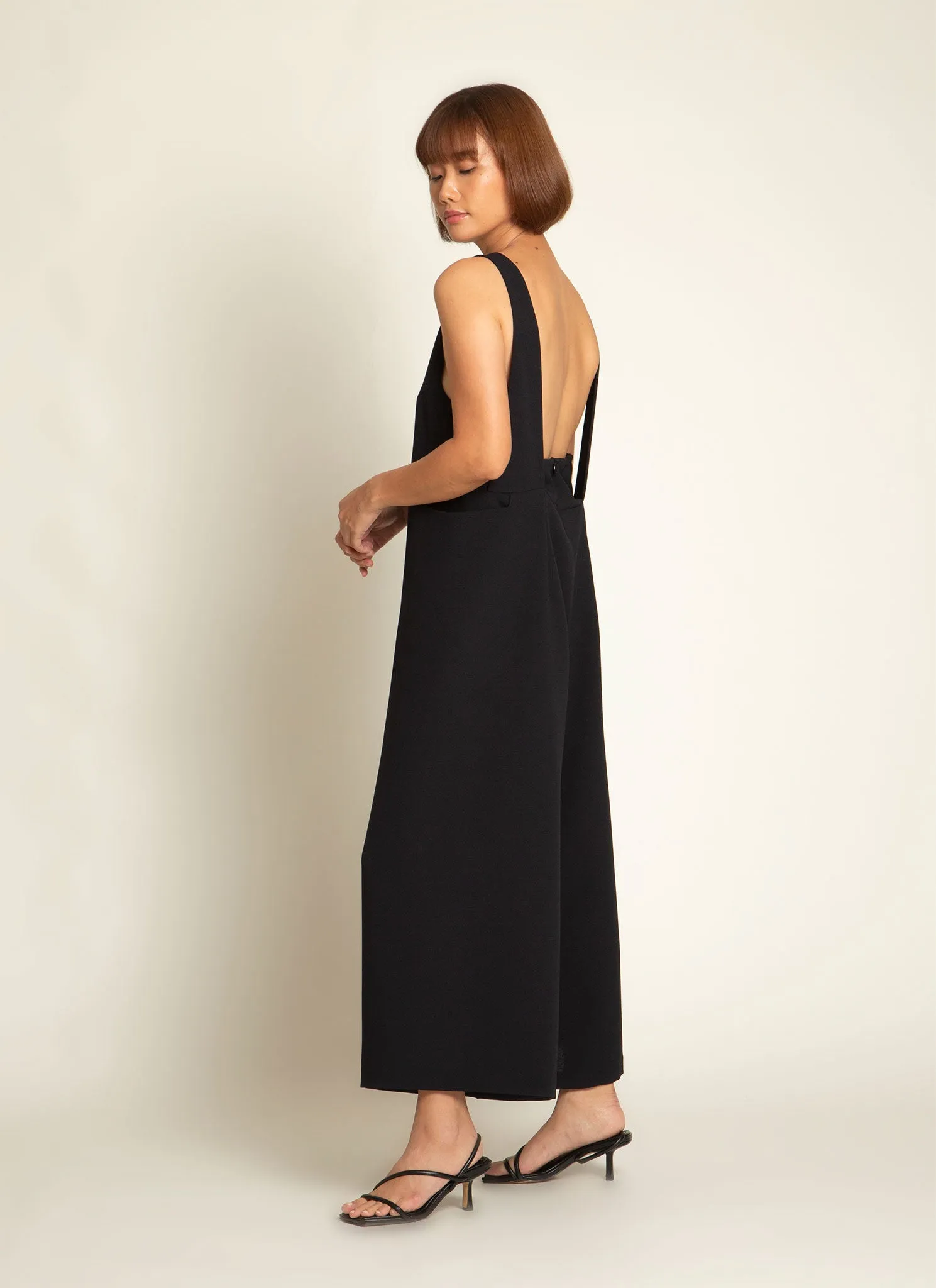Mỹ A Open Back Pocket Jumpsuit in Black Blue