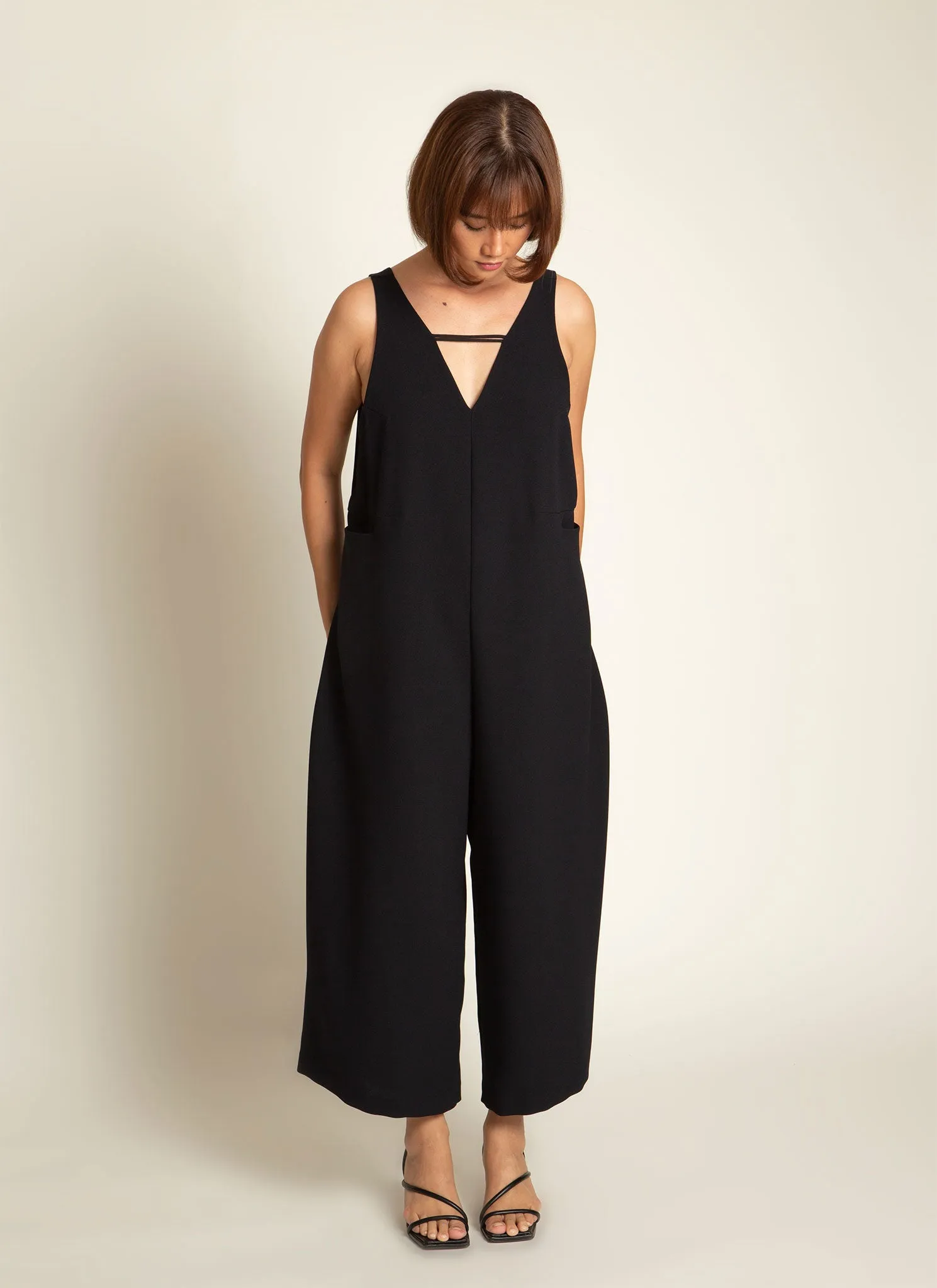 Mỹ A Open Back Pocket Jumpsuit in Black Blue