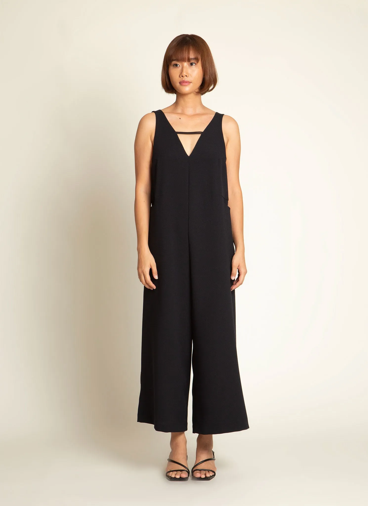 Mỹ A Open Back Pocket Jumpsuit in Black Blue