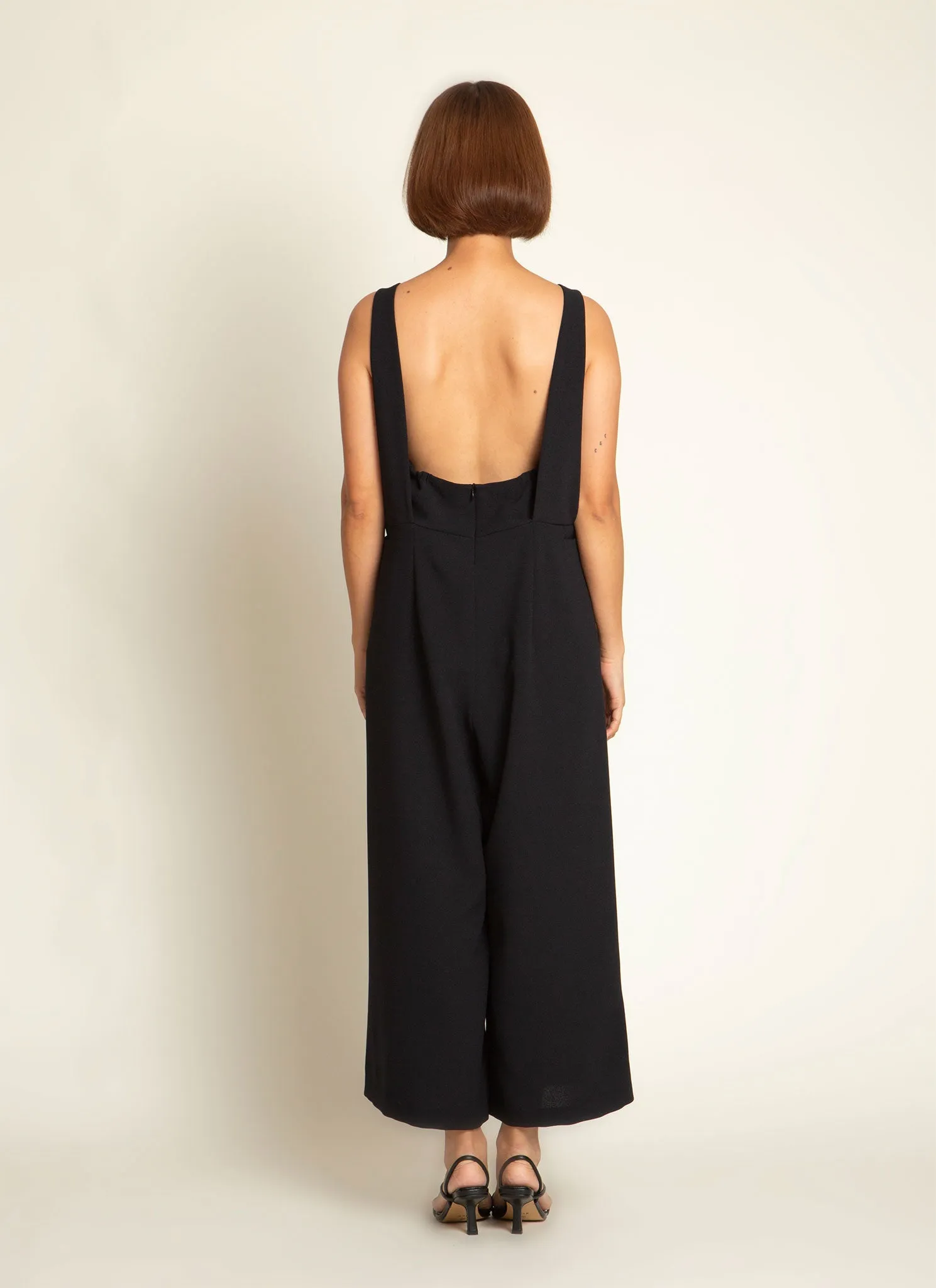Mỹ A Open Back Pocket Jumpsuit in Black Blue