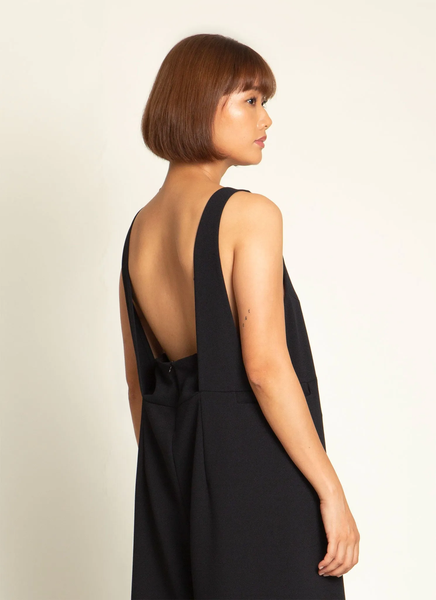 Mỹ A Open Back Pocket Jumpsuit in Black Blue